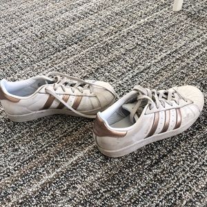 Gold adidas superstars